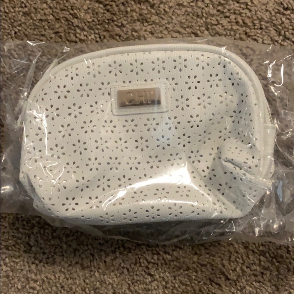 White chi cosmetic bag, new
